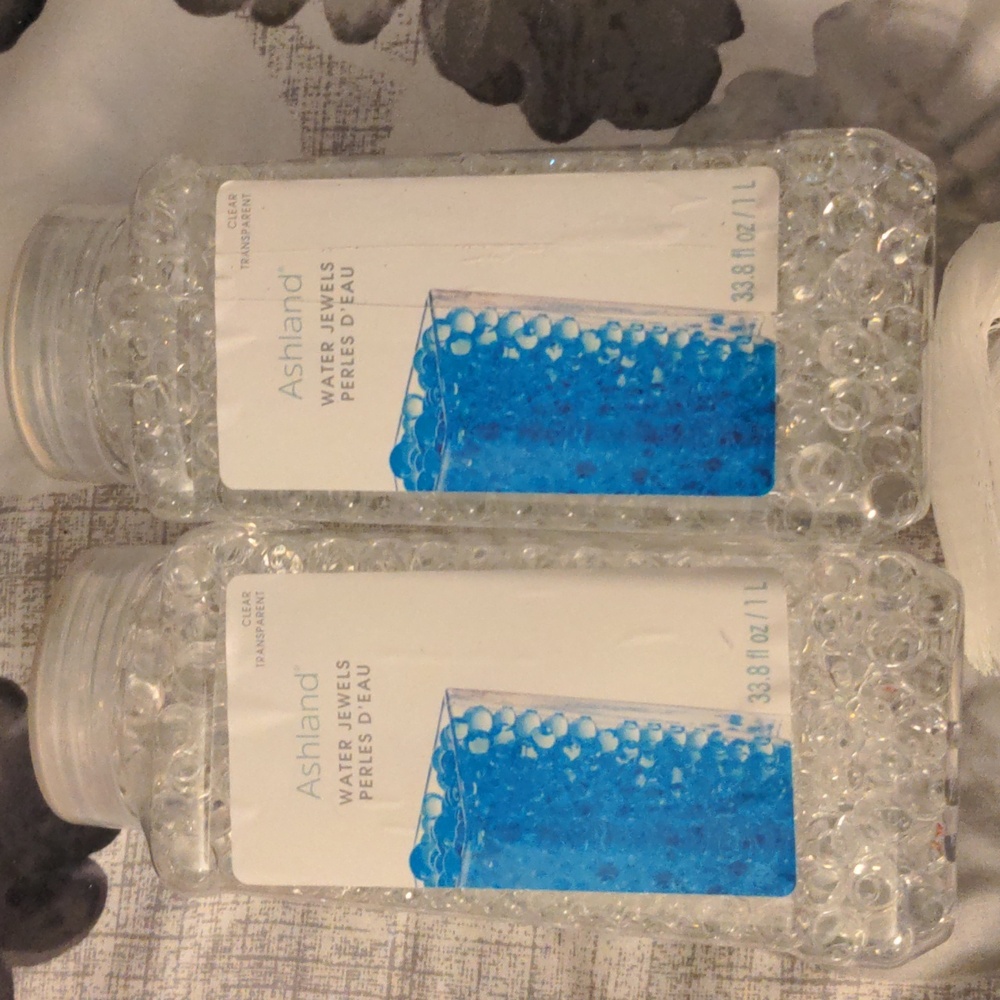 Clear water jewels with floating candles